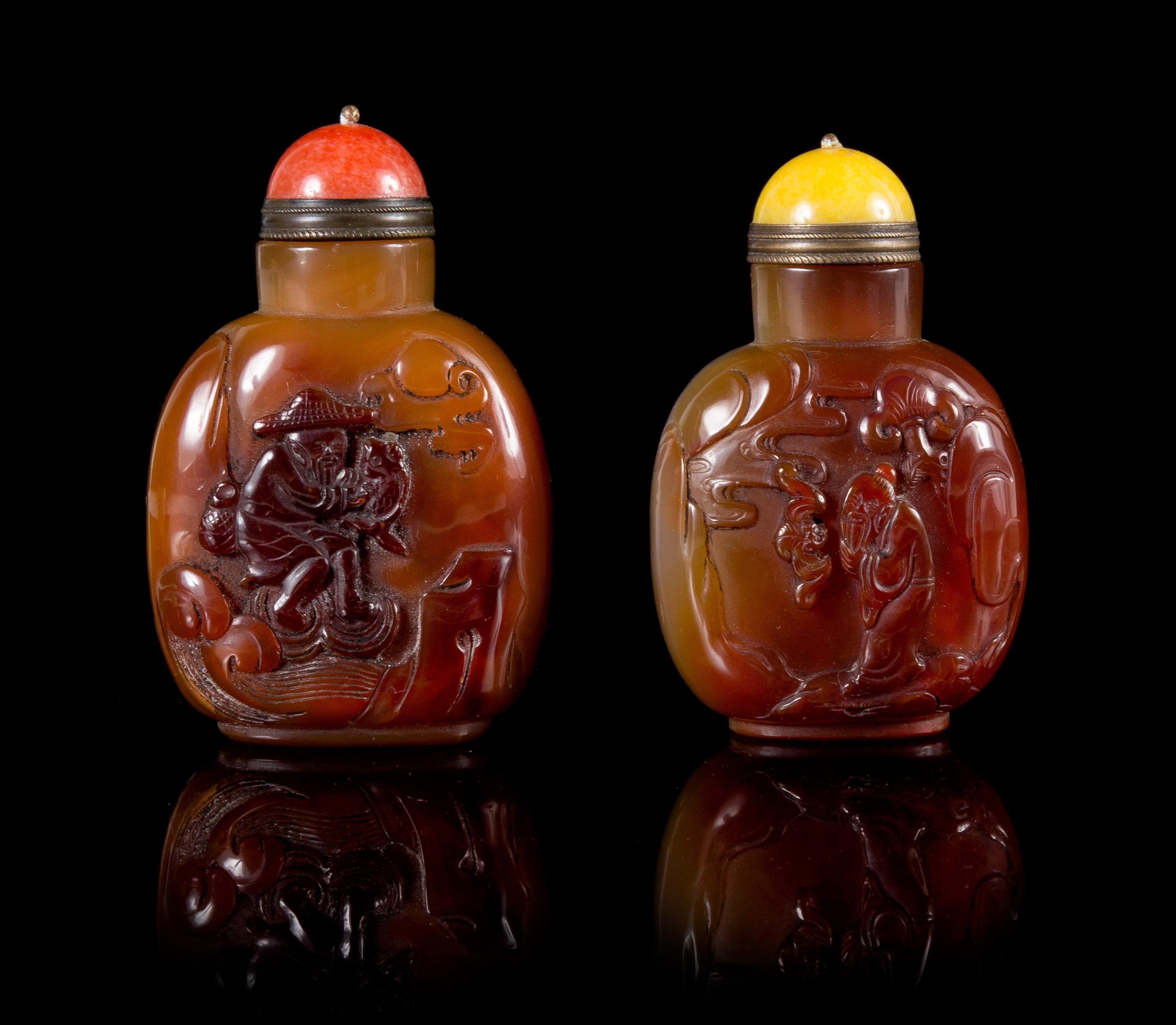 Two Carved Agate Snuff Bottles Height of larger 3 1/4 inches.