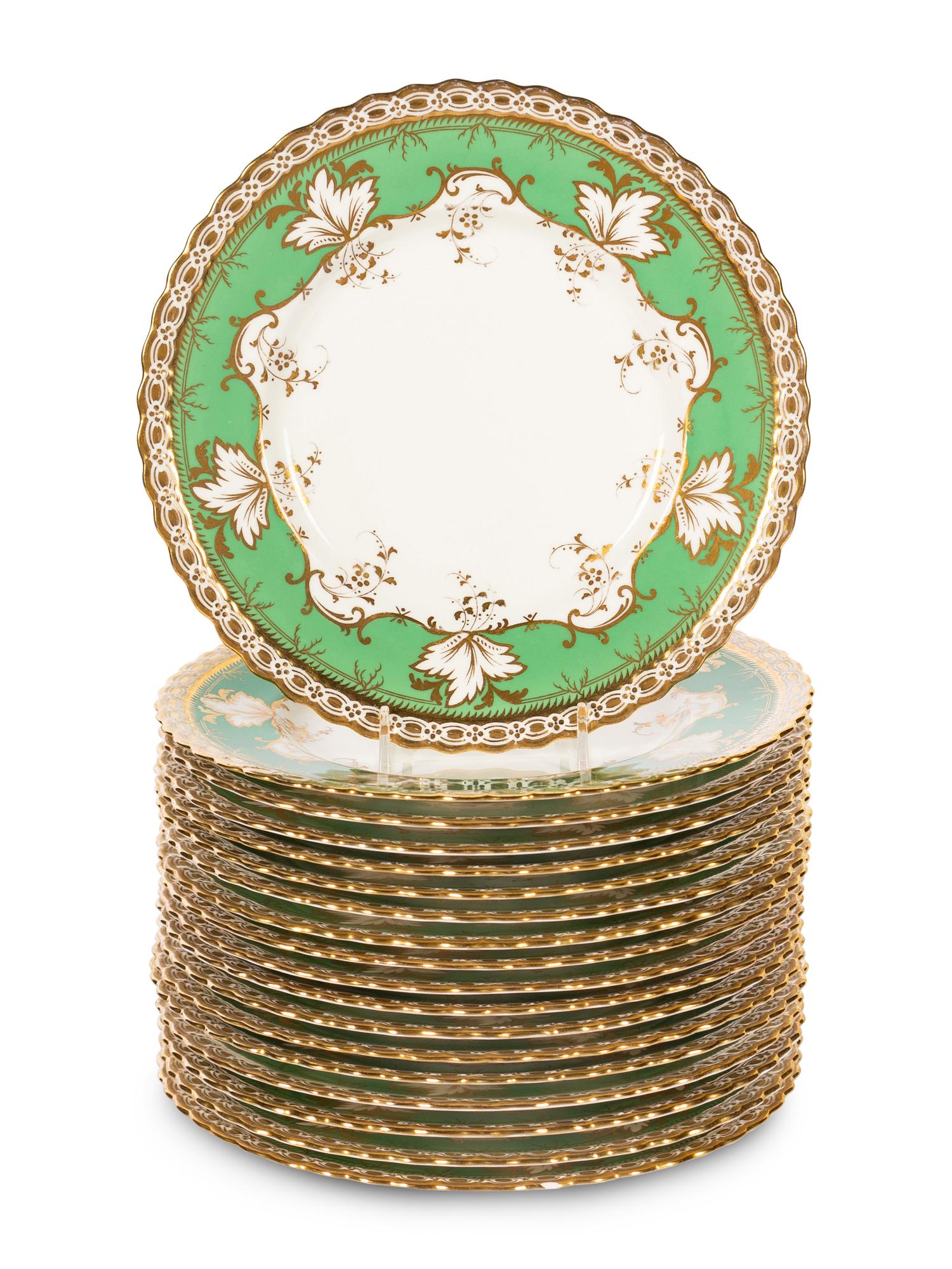 A Set of Eighteen Mintons Parcel Gilt Porcelain Dessert Plates