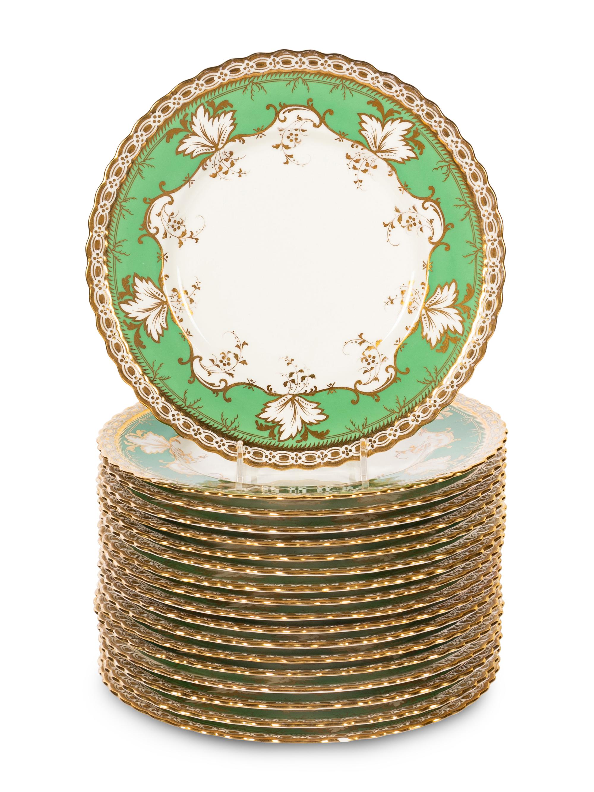 A Set of Eighteen Mintons Parcel Gilt Porcelain Dessert Plates