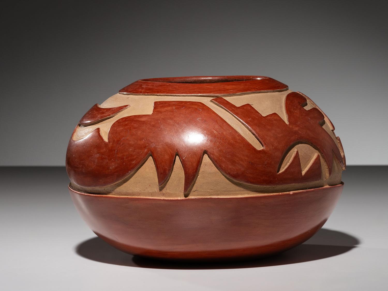 Carved Redware Pottery Jar, with Avanyu