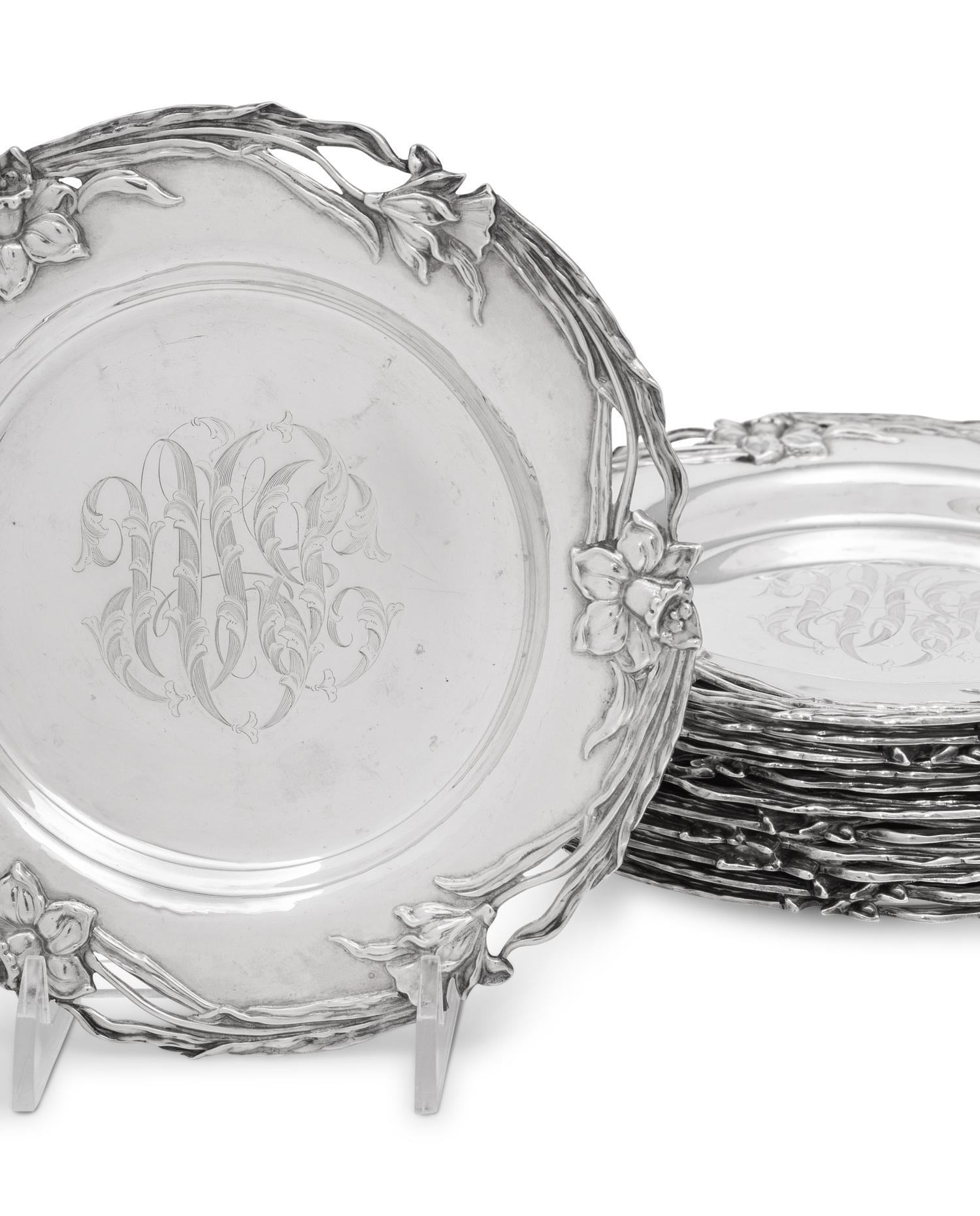 A Set of Twelve American Arts and Crafts Silver Bread Plates