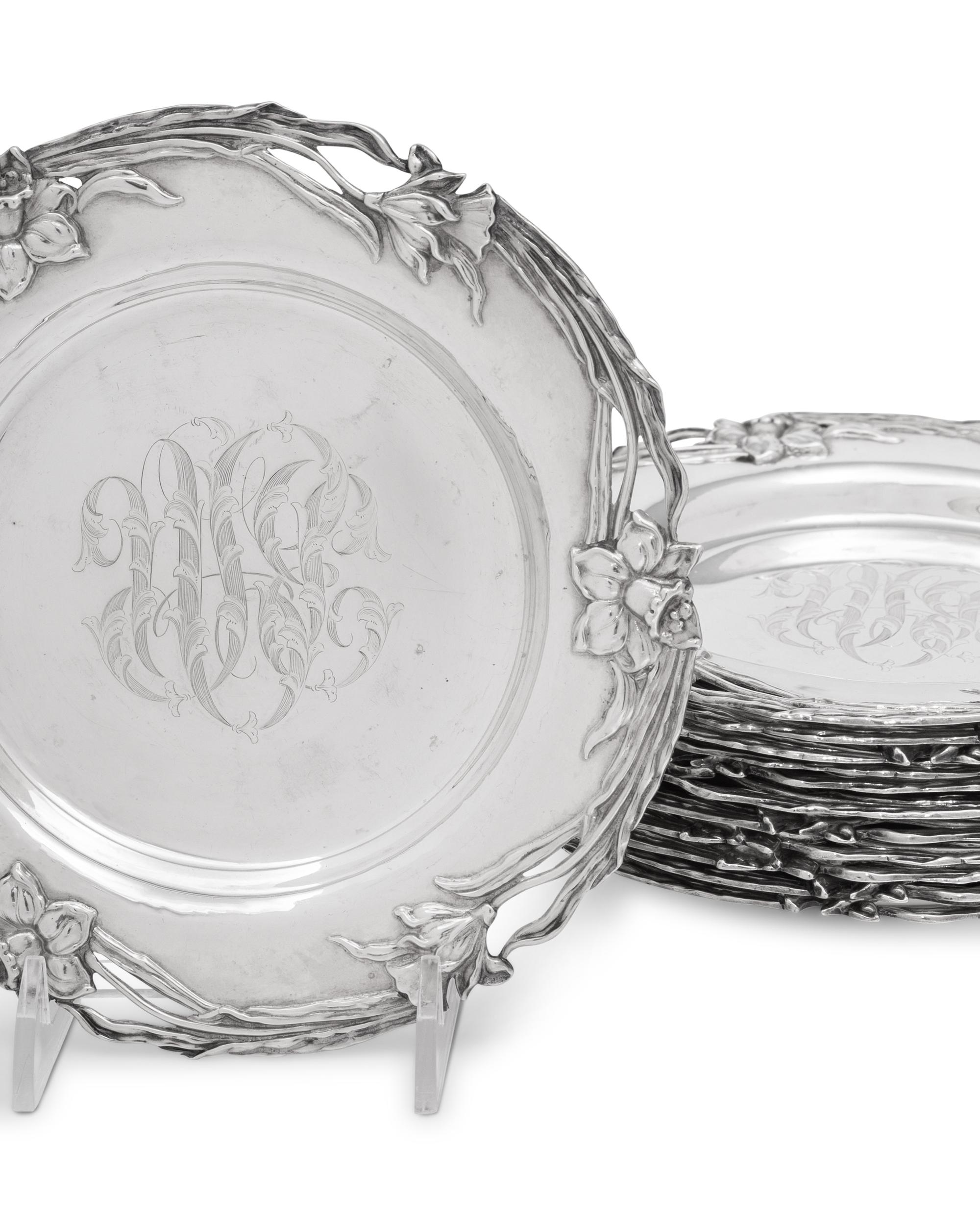 A Set of Twelve American Arts and Crafts Silver Bread Plates