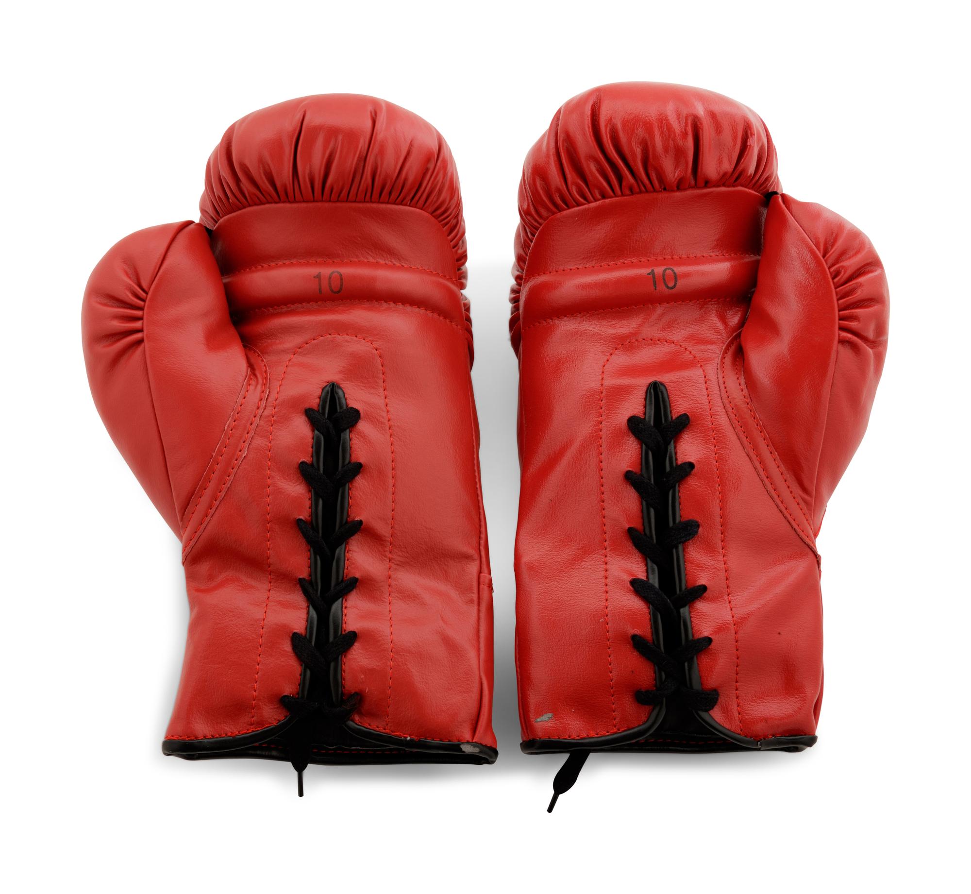 A Pair of Muhammad Ali Boxing Gloves (One Signed),