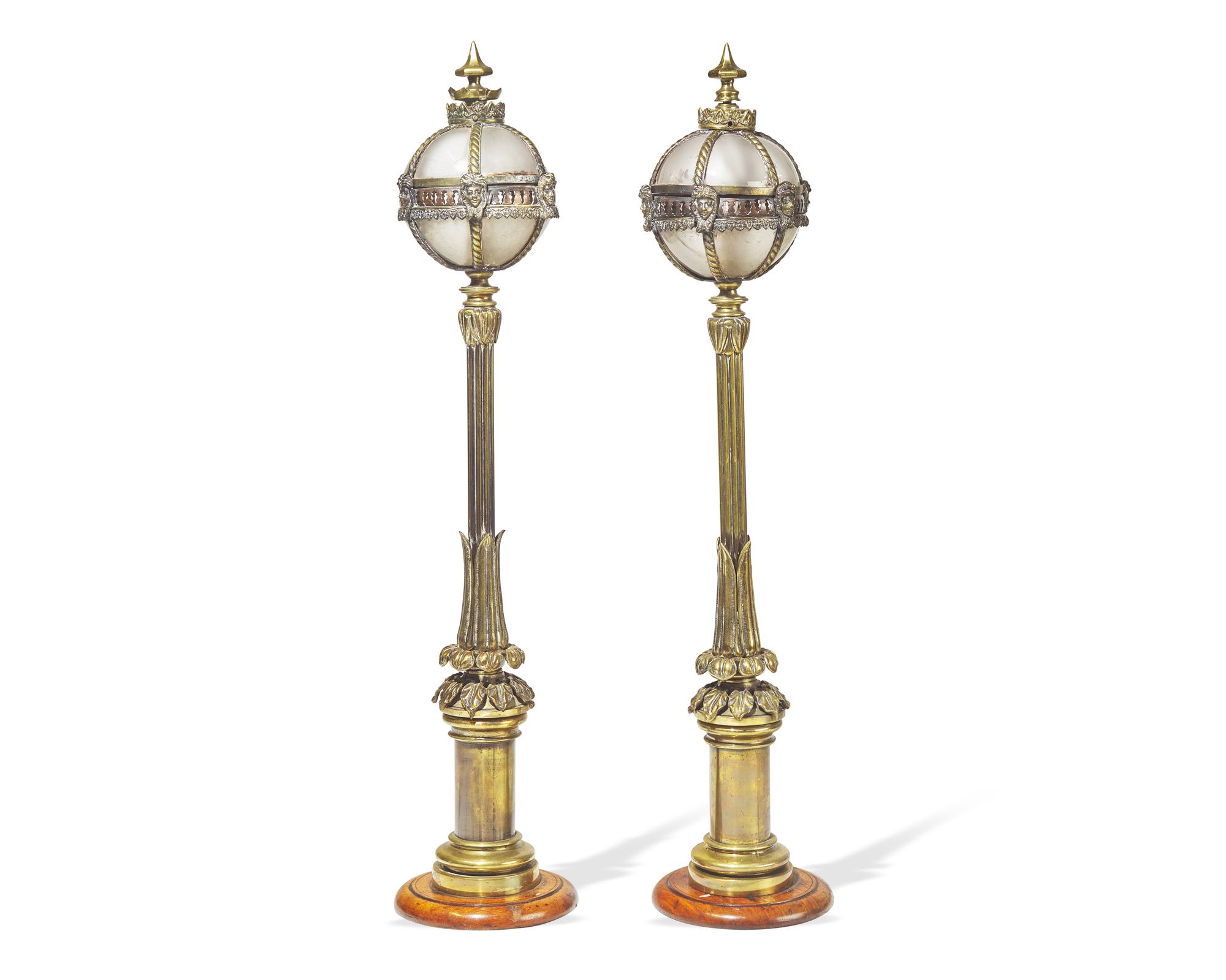 A pair of Belle Epoque gilt bronze and walnut table lamps in the form of miniature street lamps, late 19th century