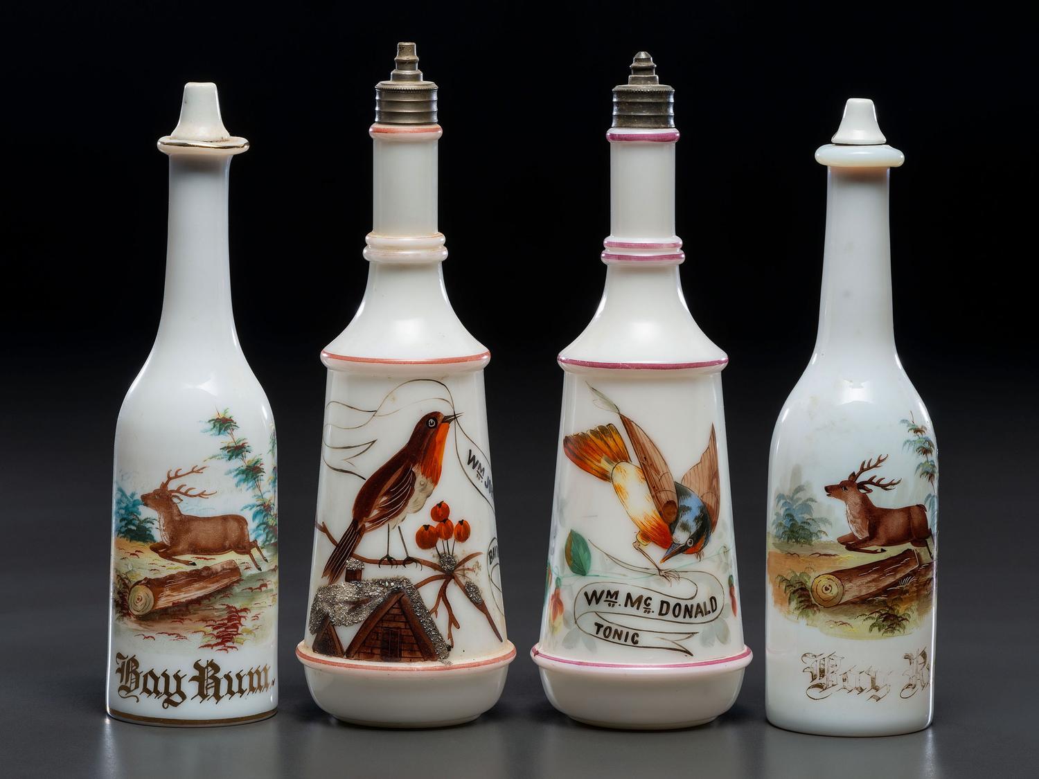 Four Milk Glass Barber Bottles