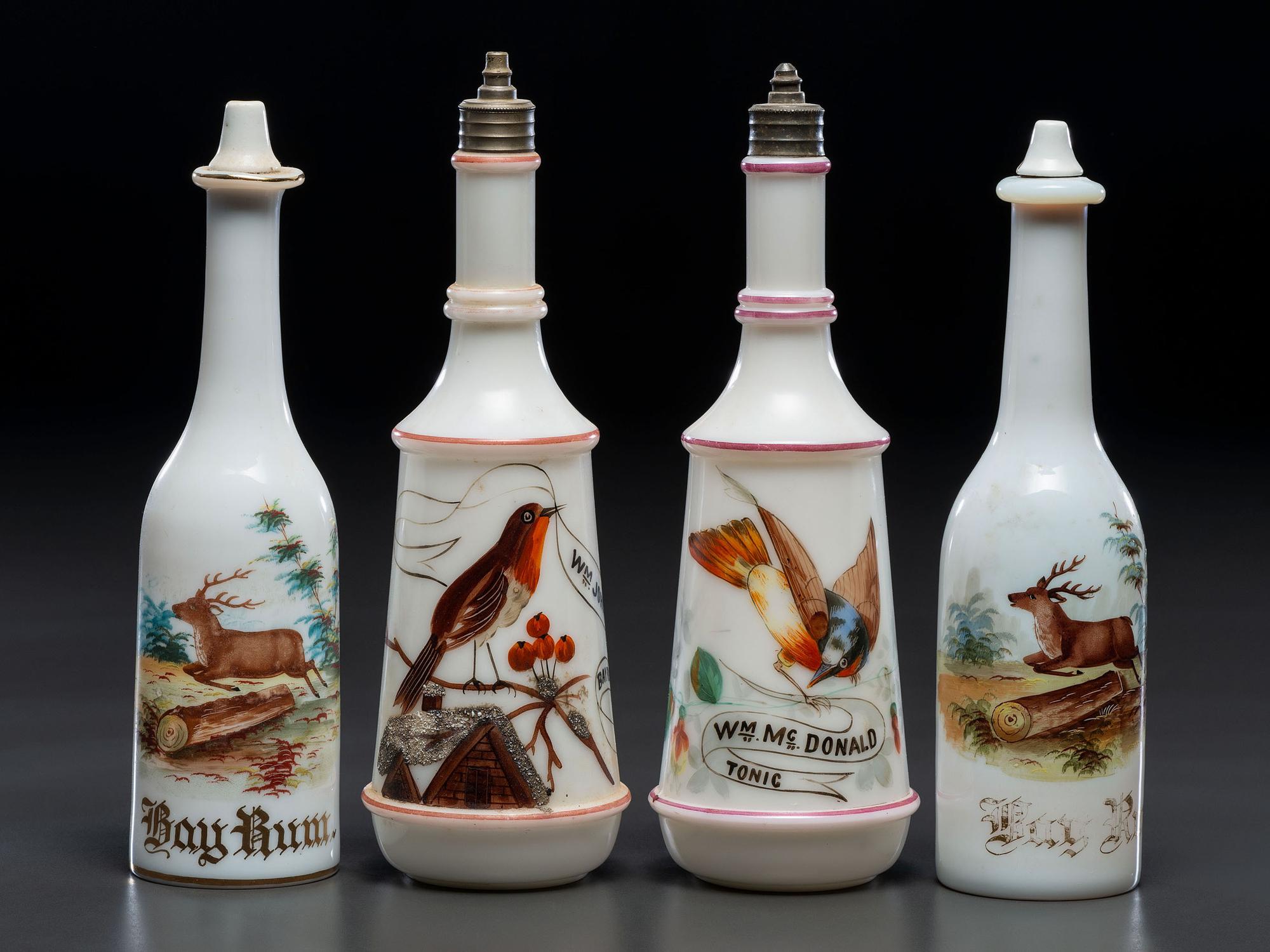 Four Milk Glass Barber Bottles