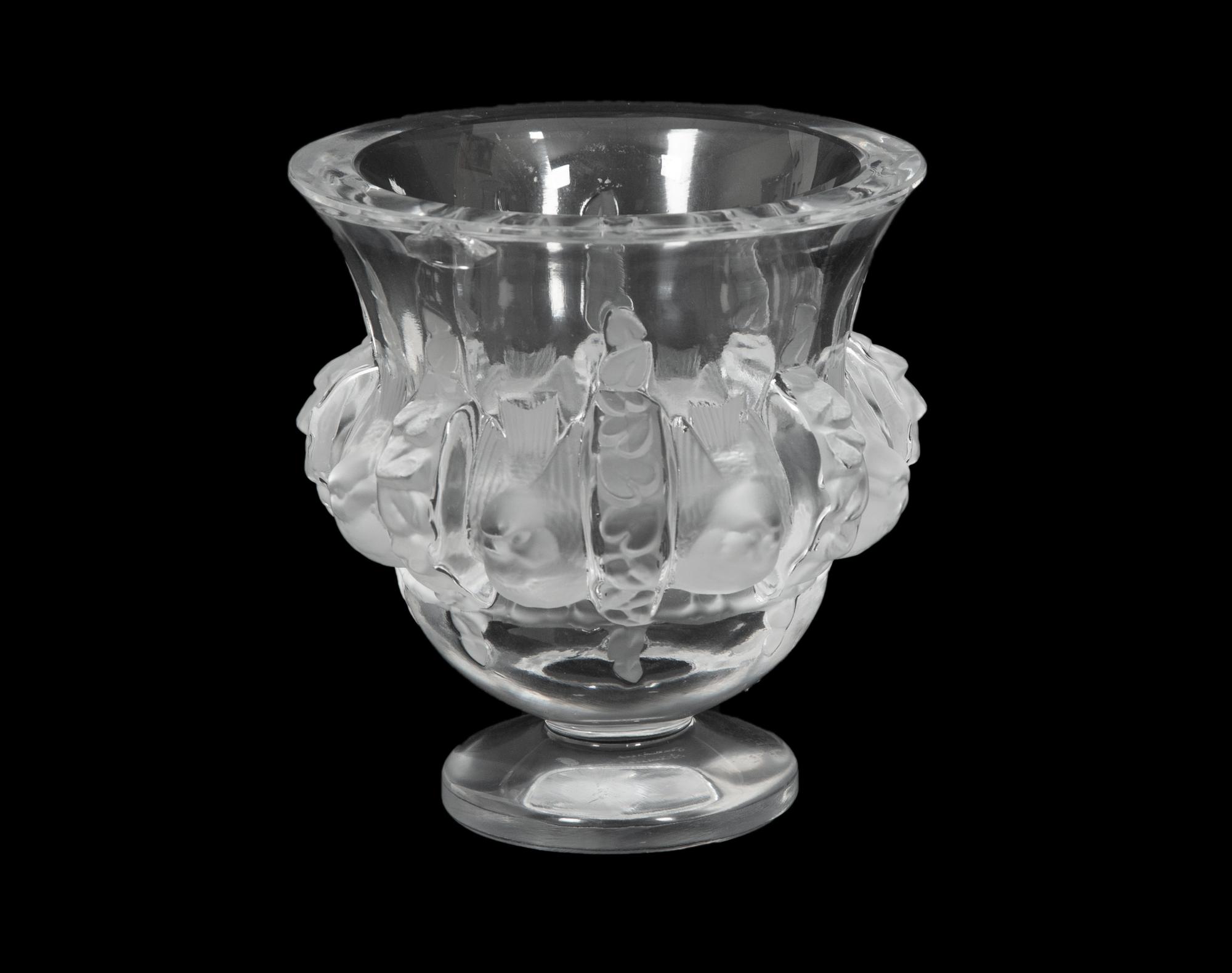 A Group of Three Lalique Vases and a Decanter