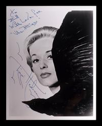 (Celebrity) A group of 20 autographed photographs of celebrities, comprising: