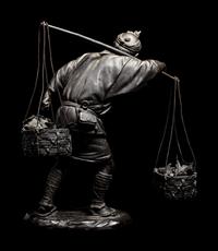 A Large Bronze Okimono of a Man