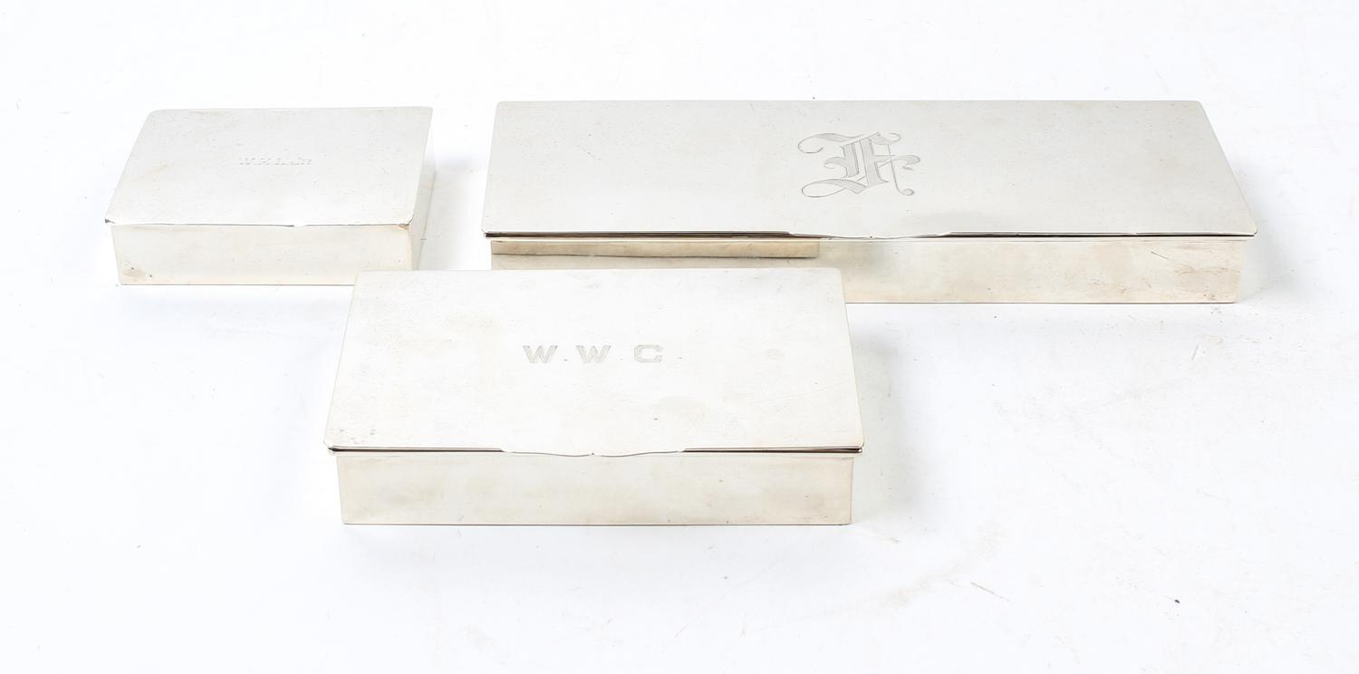 Three American Silver Cigarette Boxes Width of first 10 inches.