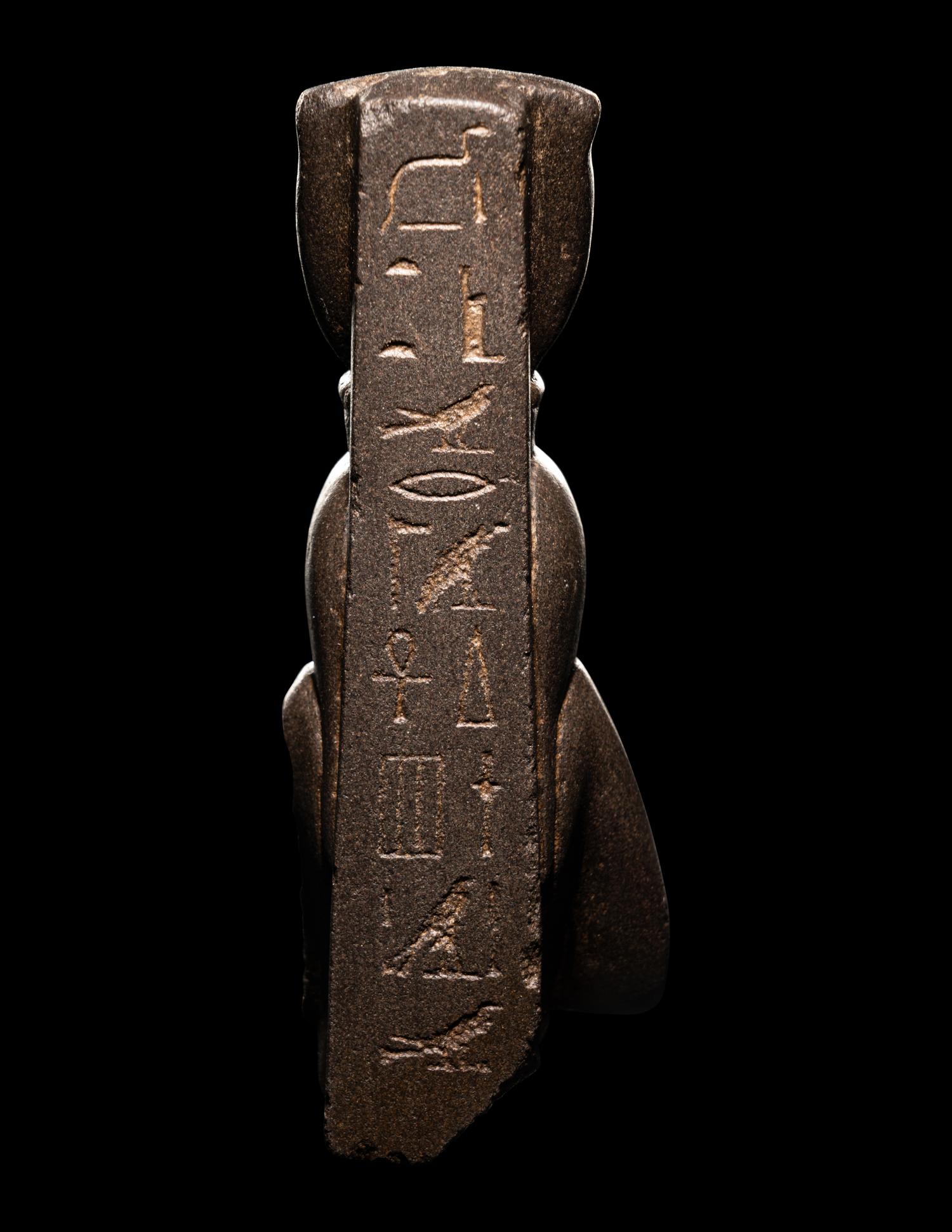 An Egyptian Greywacke Bust of Isis-Hathor