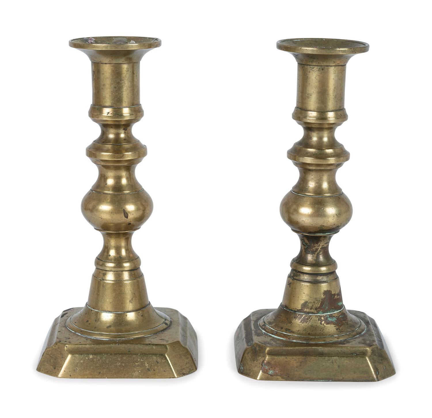 Three Pairs of English Brass Candlesticks