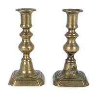 Three Pairs of English Brass Candlesticks