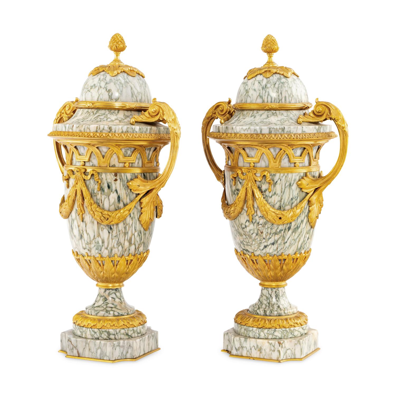 A Pair of Louis XVI Style Marble and Gilt Bronze Mounted Urns