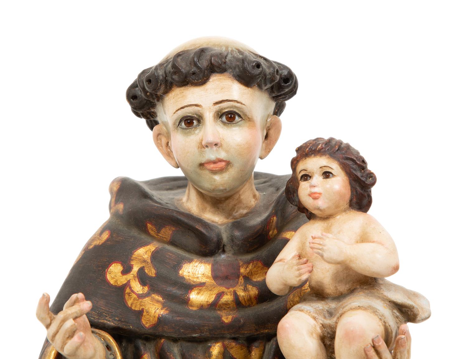 A Continental Polychrome Painted and Parcel Gilt Figure of St. Anthony of Padua