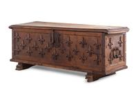 A Continental Carved Walnut Cassone