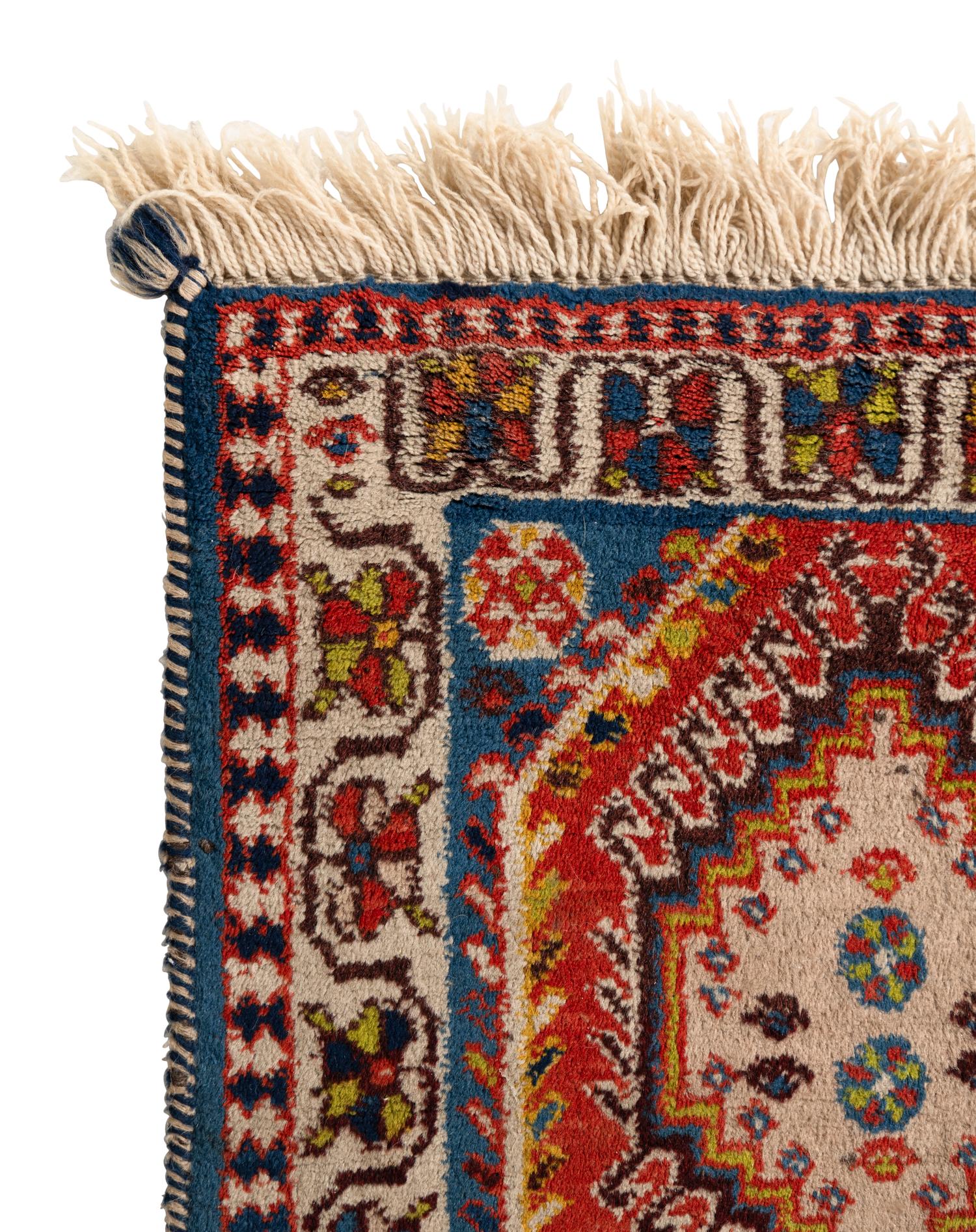 A Group of Three Wool Rugs