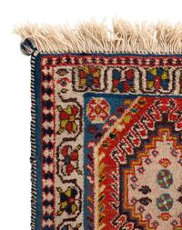 A Group of Three Wool Rugs