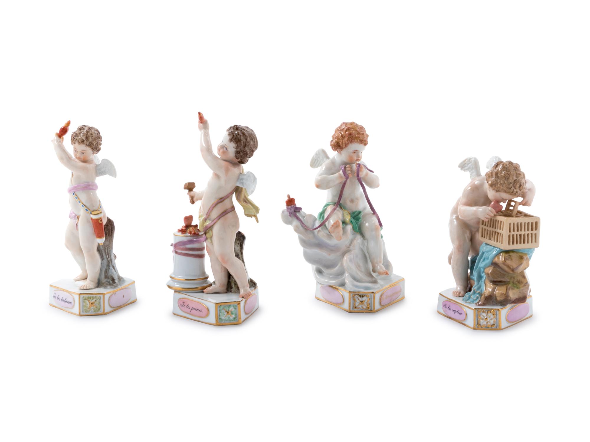 Four Meissen Painted and Parcel Gilt Porcelain Motto Figures