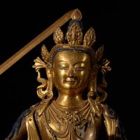 A Sino-Tibetan Gilt Bronze Figure of the Bodhisattva Manjusri 銅鎏金文殊菩薩坐像