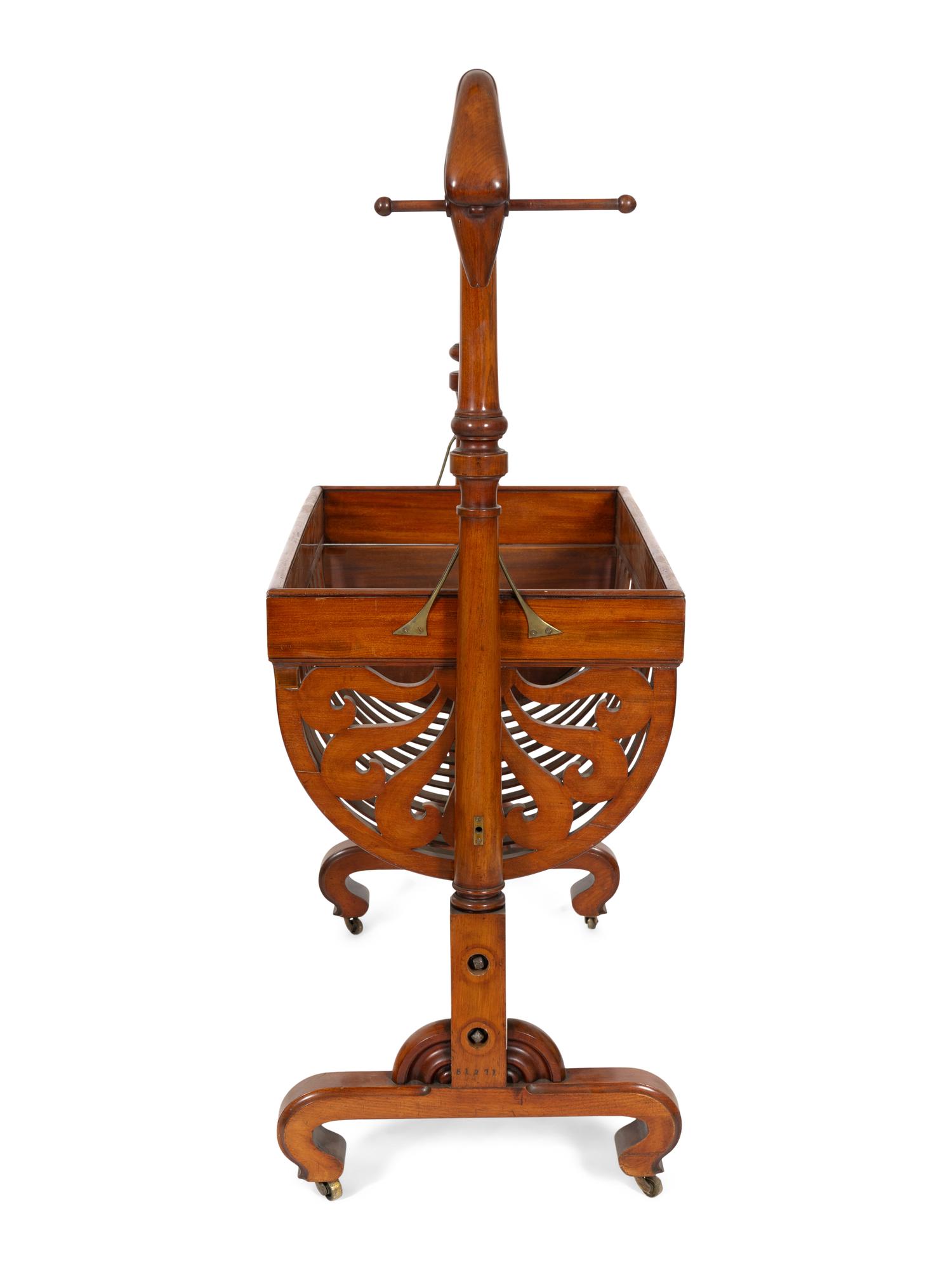 A Biedermeier Mahogany Rocking Crib