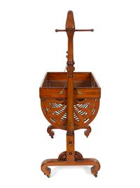 A Biedermeier Mahogany Rocking Crib