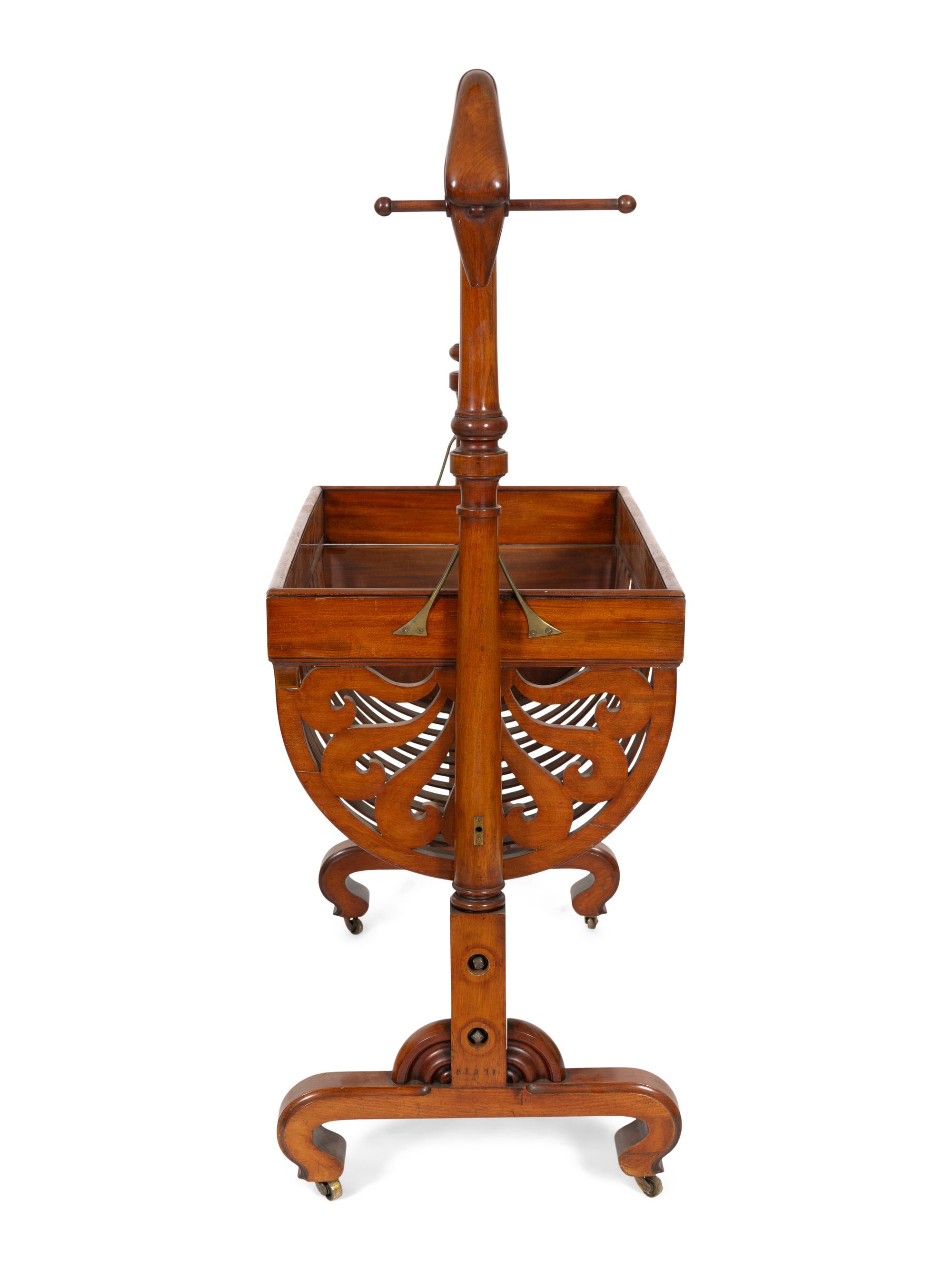 A Biedermeier Mahogany Rocking Crib