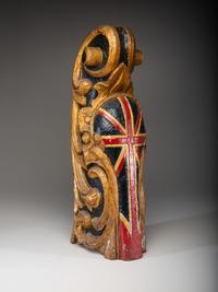 A Carved and Parcel Gilt Union Jack Mast Head