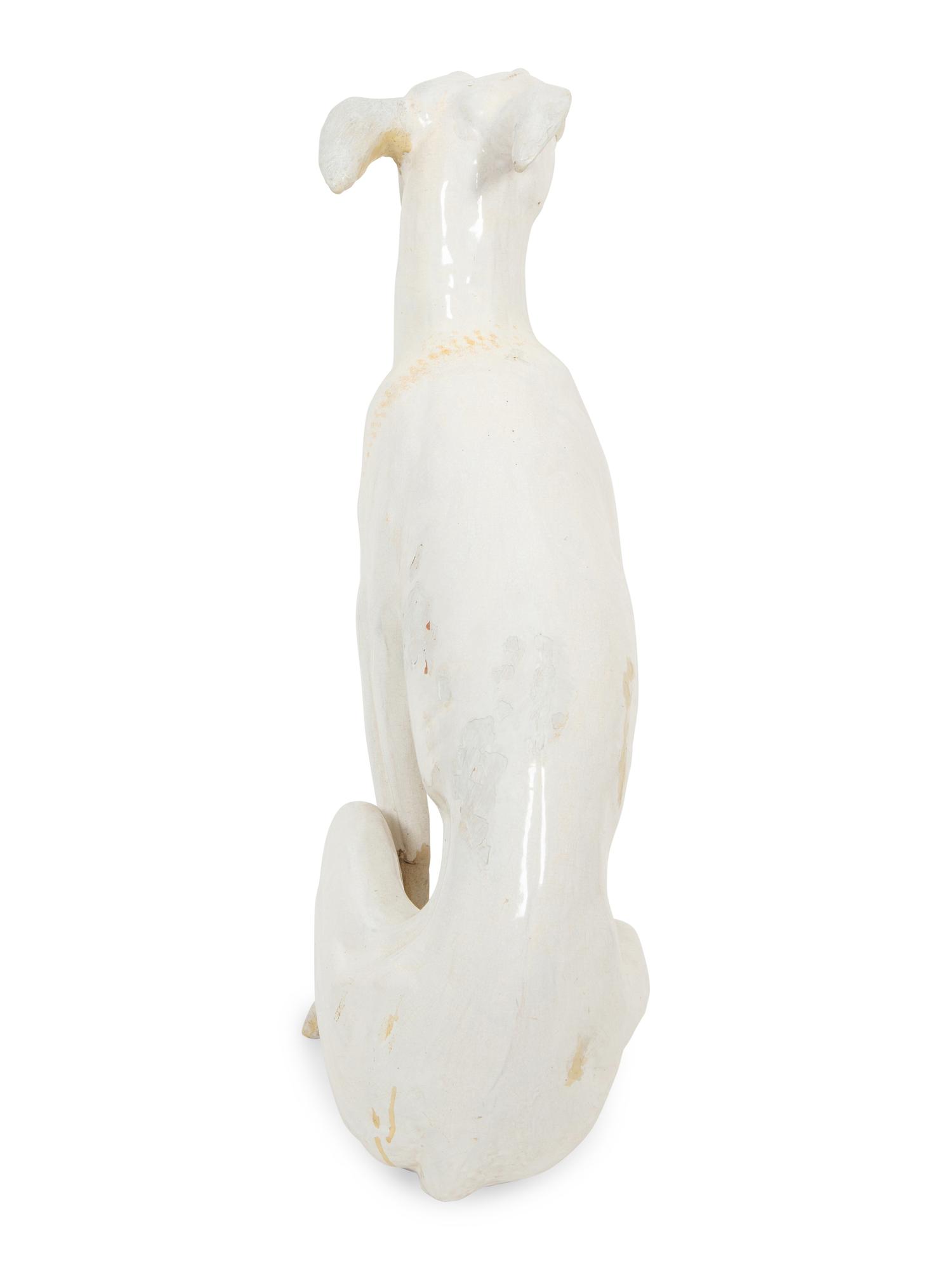 An Italian Glazed Earthenware Greyhound