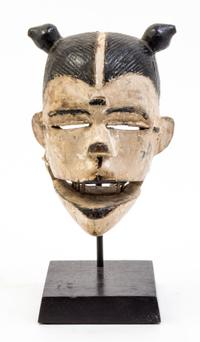 A White-Faced Punu Mask Height overall 10 1/4 inches.