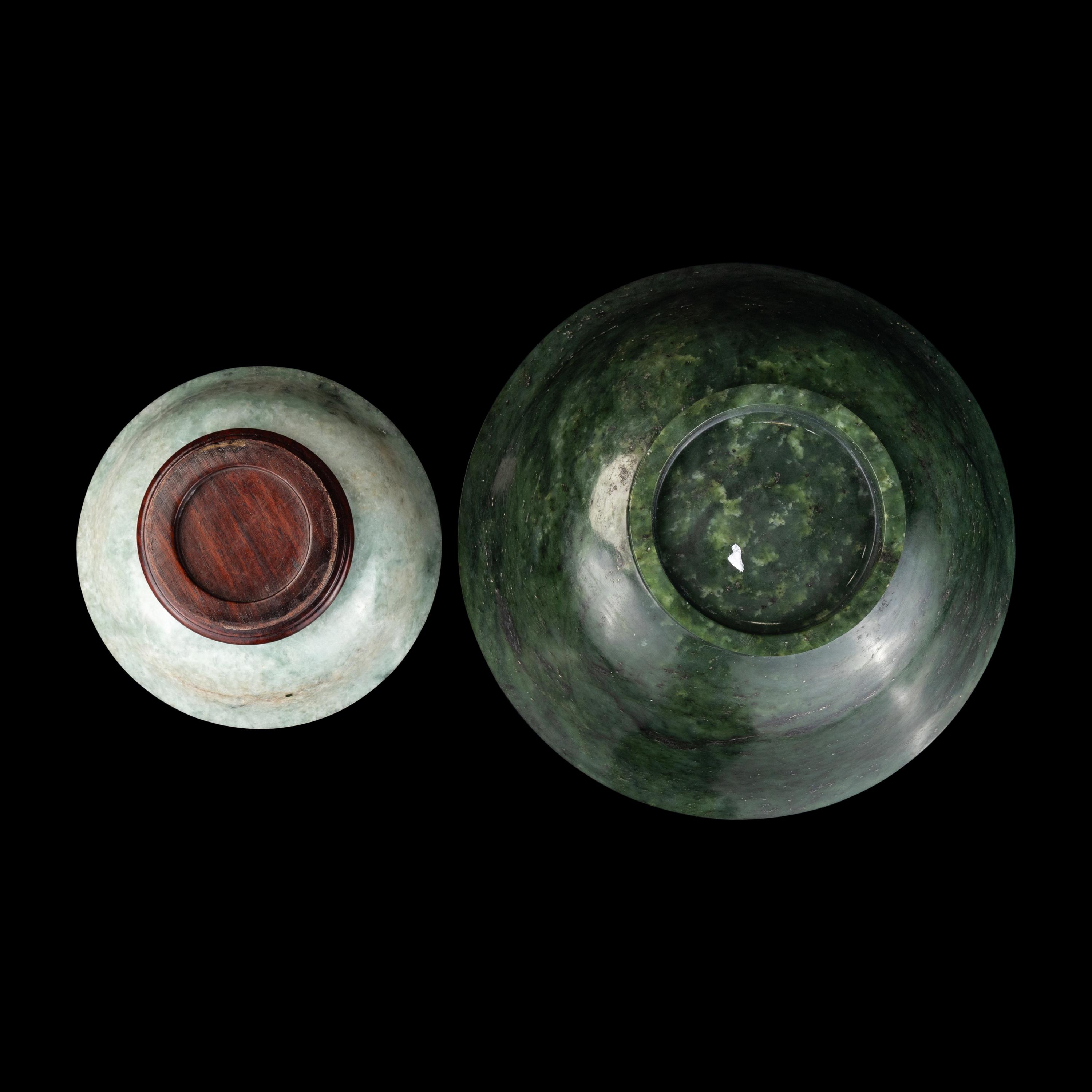 A Chinese Jadeite Bowl and a Spinach Jade Bowl, Early-Mid 20th Century 近代 翡翠、碧玉碗各一