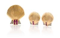 A 14 Karat Gold, Ruby and Diamond Shell Brooch, Tiffany & Co., with Similar Earclips, 16.30 dwts.