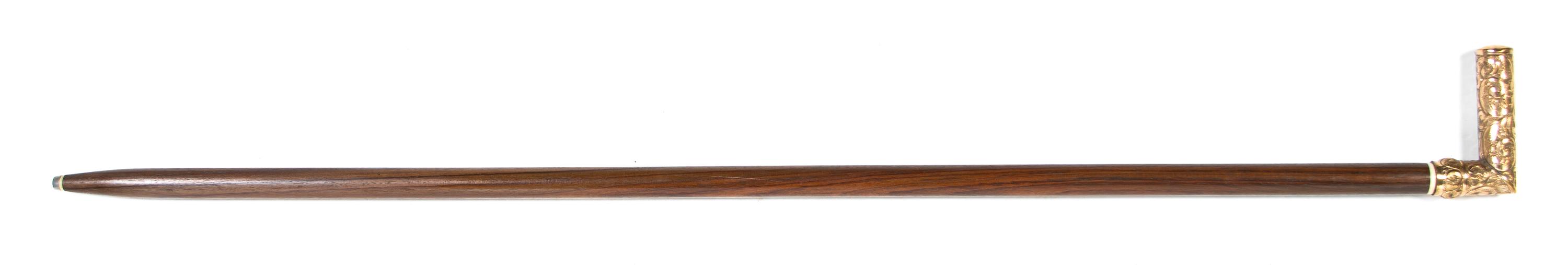 A Late Victorian Gold Filled Presentation Cane Handle, Height overall 38 3/4 x width of handle 3 7/8 inches.