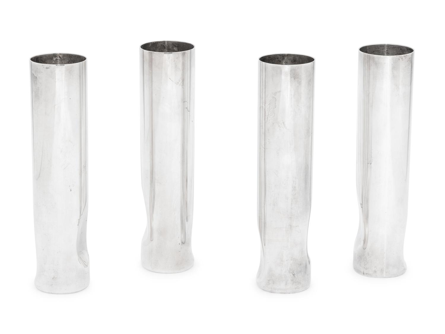 A Set of Four Elsa Peretti for Tiffany and Co. Italian Silver Thumbprint Bud Vases