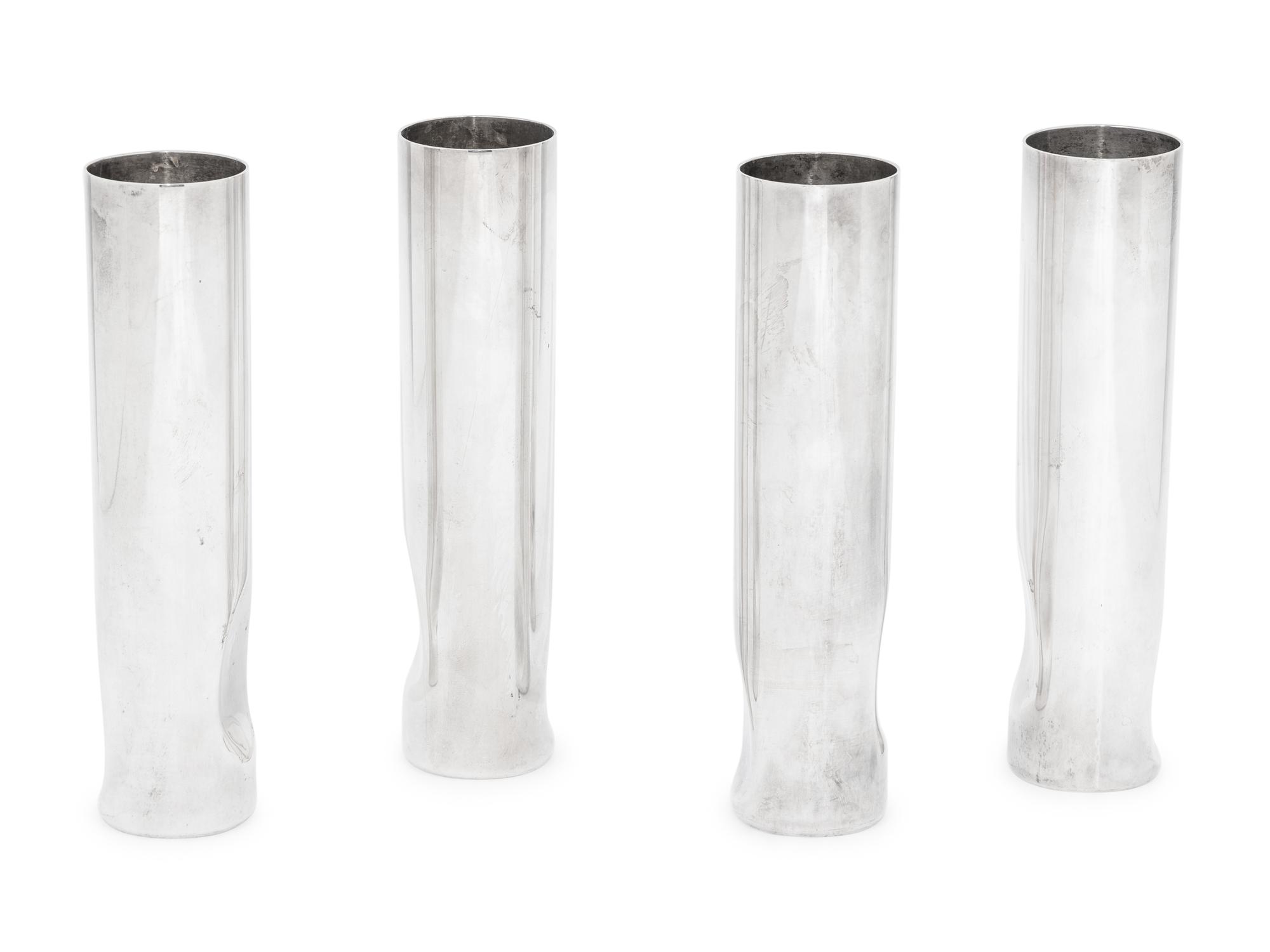 A Set of Four Elsa Peretti for Tiffany and Co. Italian Silver Thumbprint Bud Vases