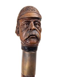 Two Figural Carved Canes