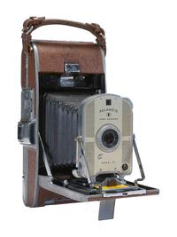 [CAMERAS]. 3 Polaroid cameras, incl. SX70 and Model 95 outfit with accessories.