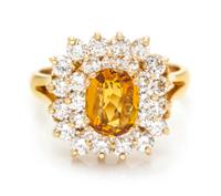 An 18 Karat Yellow Gold, Yellow Sapphire and Diamond Ring, 4.60 dwts.