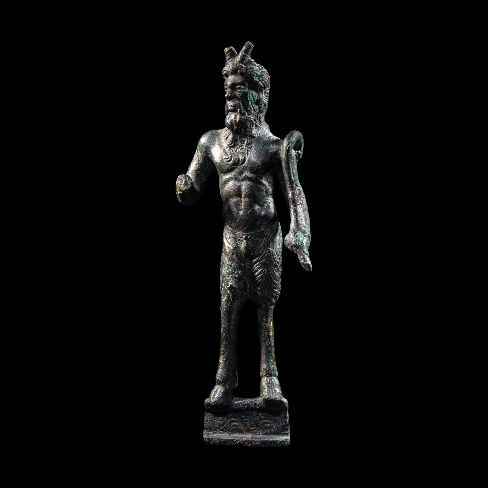 A Roman Bronze Satyr