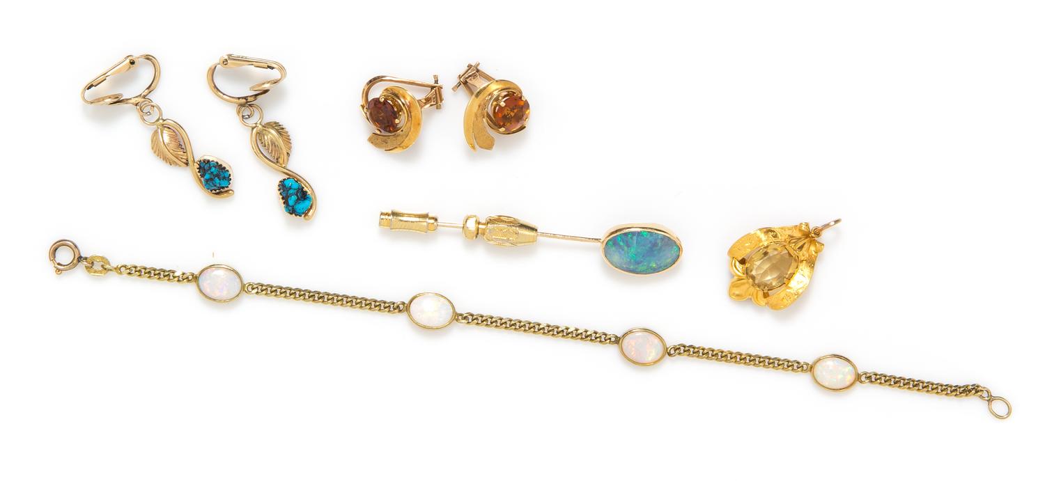 A Collection of Yellow Gold and Multi Gemstone Jewelry, 12.80 dwts.