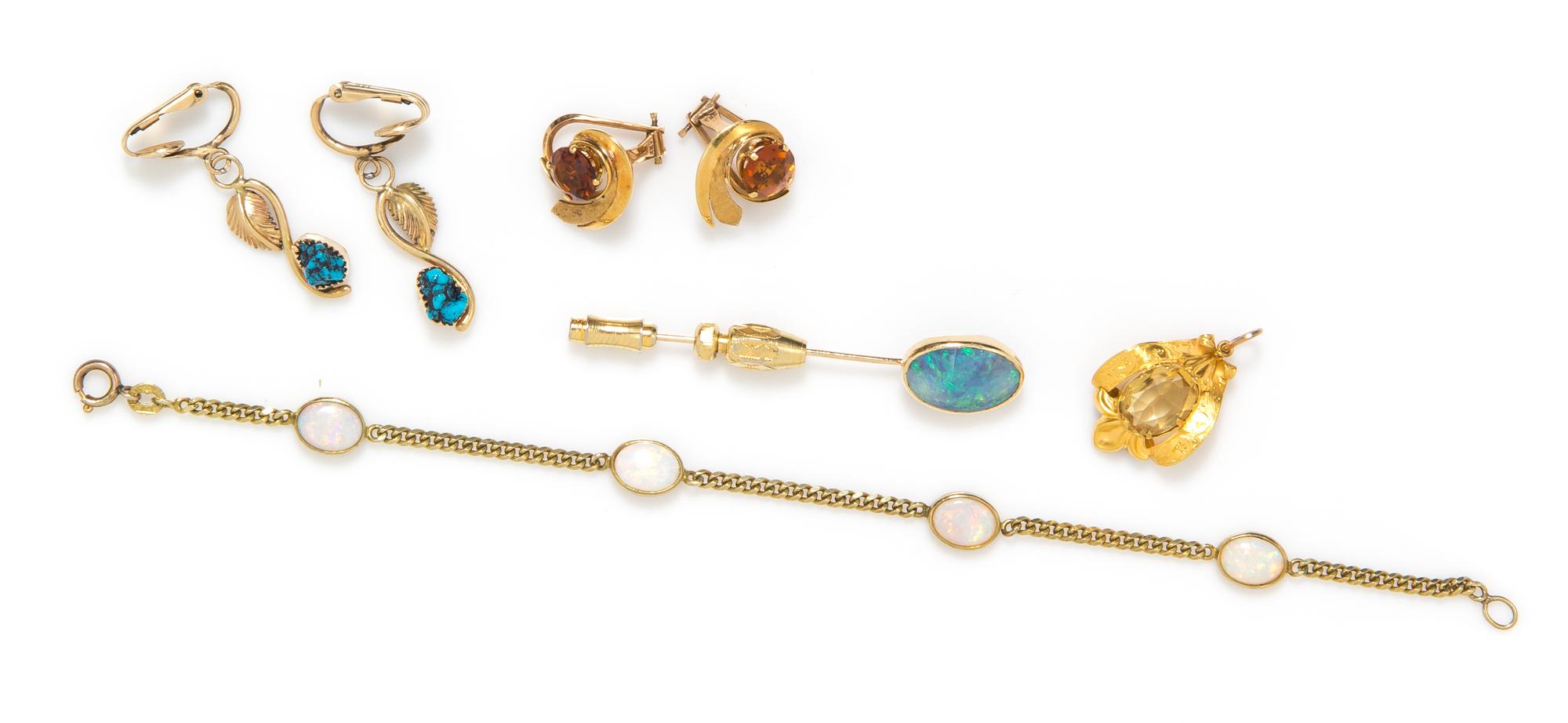 A Collection of Yellow Gold and Multi Gemstone Jewelry, 12.80 dwts.