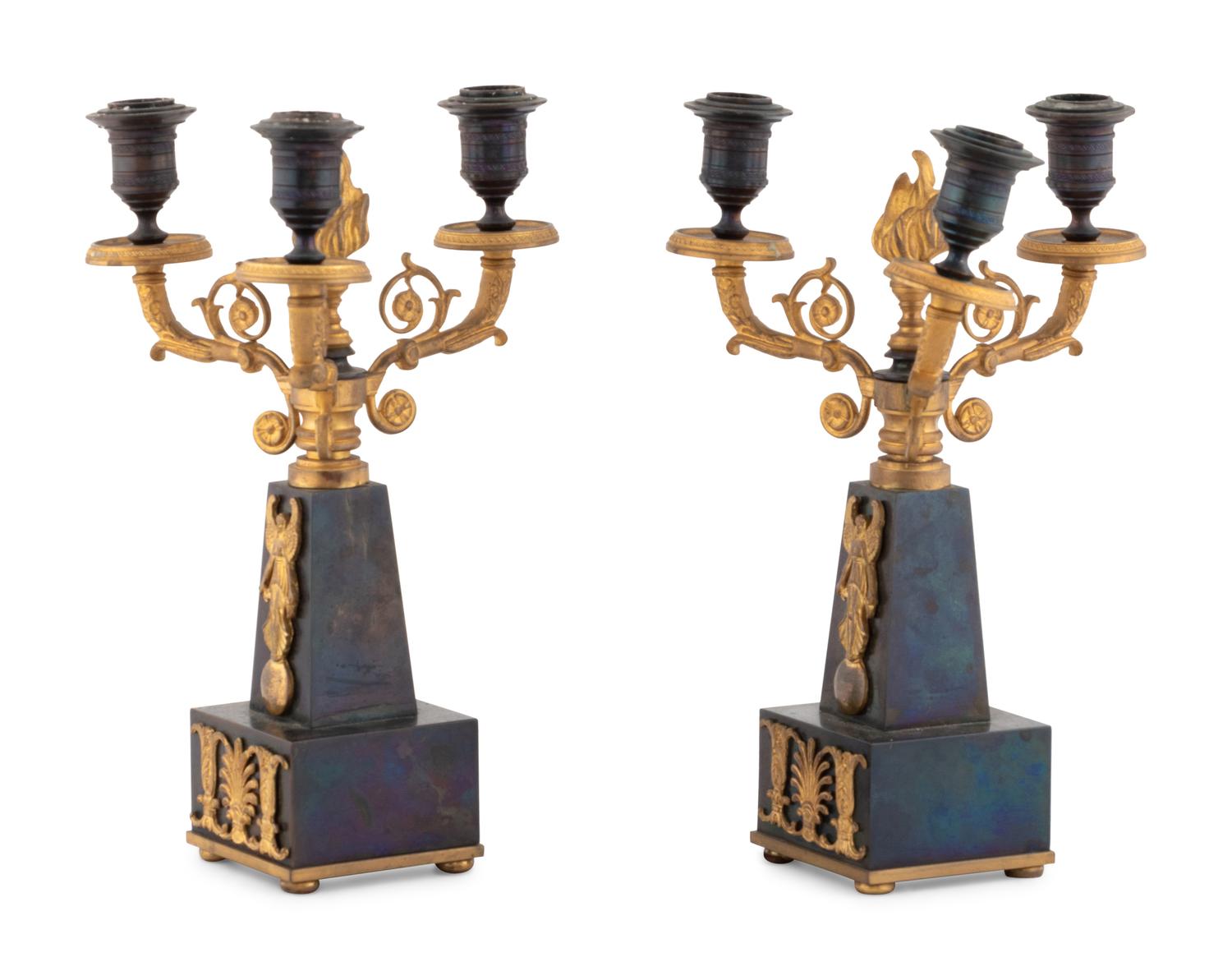 A Pair of Empire Style Gilt and Patinated Bronze Three-Light Candelabra