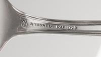 An American Silver Flatware Service, Towle Silversmiths, Newburyport, MA, Louis XIV pattern with a script S monogram, comprising: 12 di