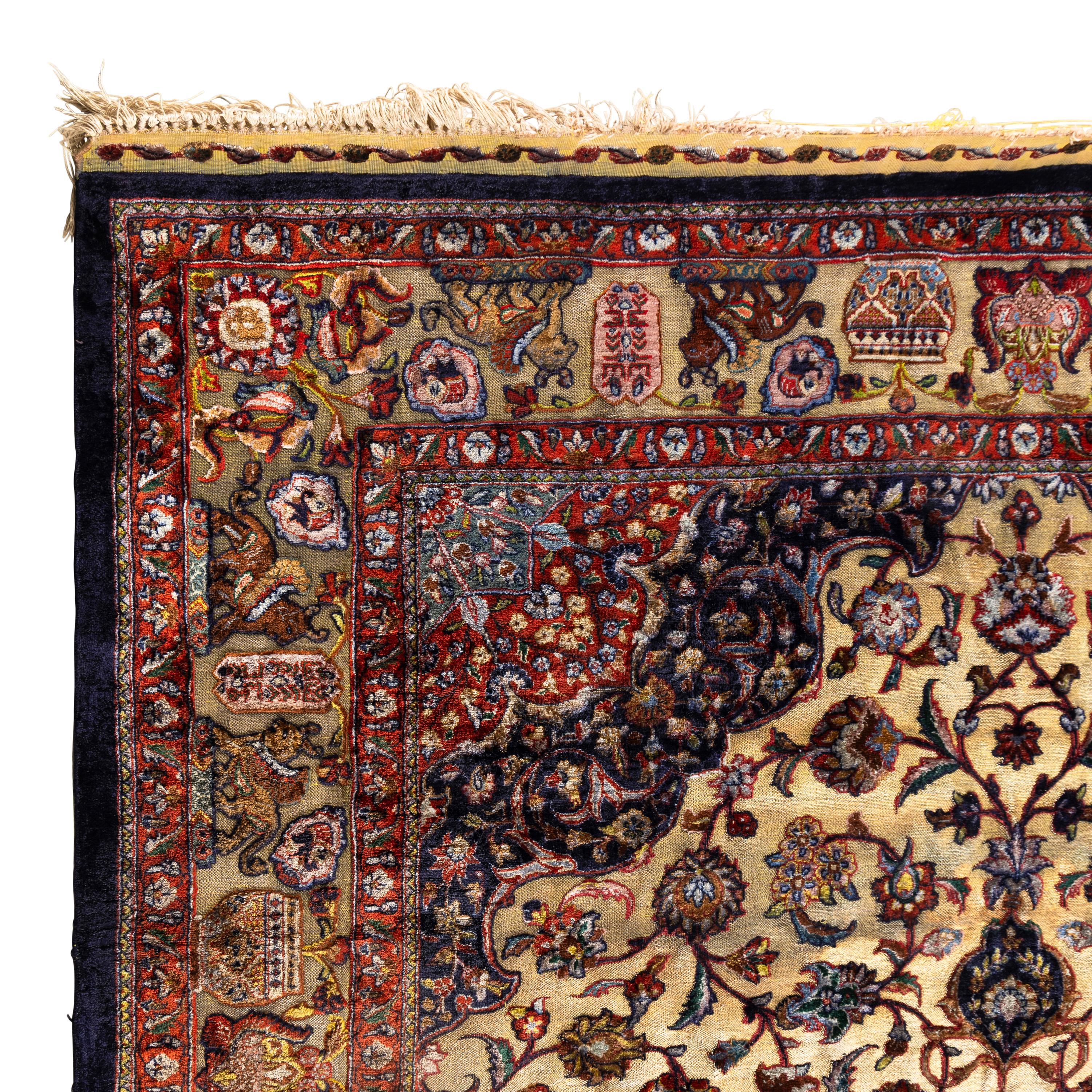 A Qom Silk and Metallic Thread Rug