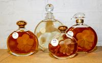 Four Large French Glass Perfume Bottles. Height of tallest 8 1/2 inches.