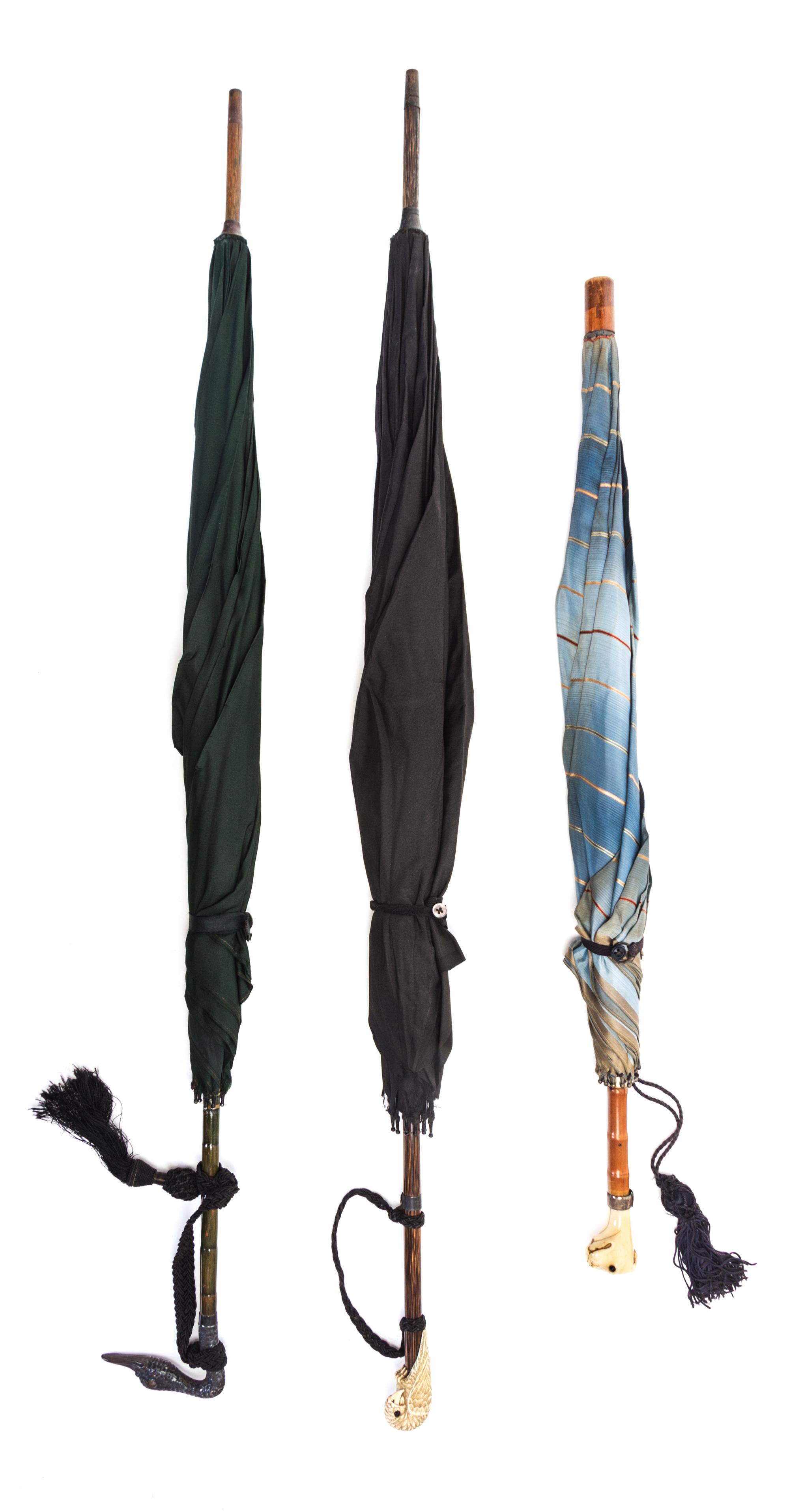 Three Victorian Umbrellas Length of longest 36 1/4 inches. — LATE 19TH/EARLY 20TH CENTURY