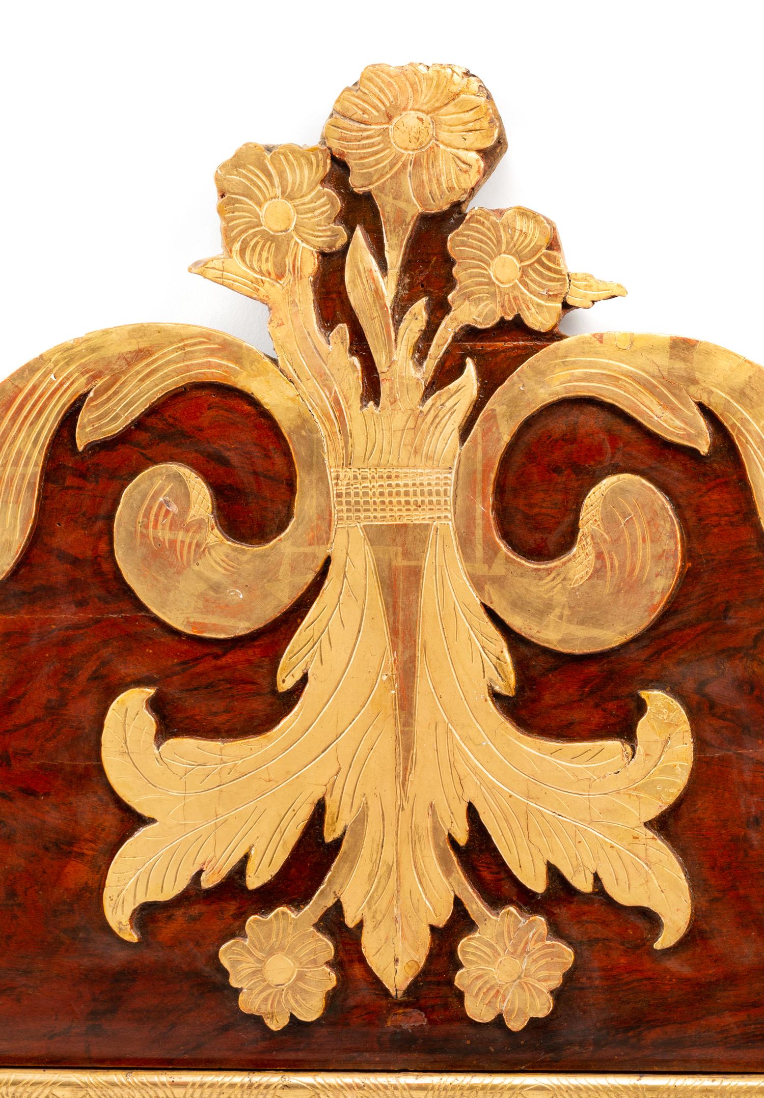 A Continental Parcel Gilt Burl Walnut Mirror