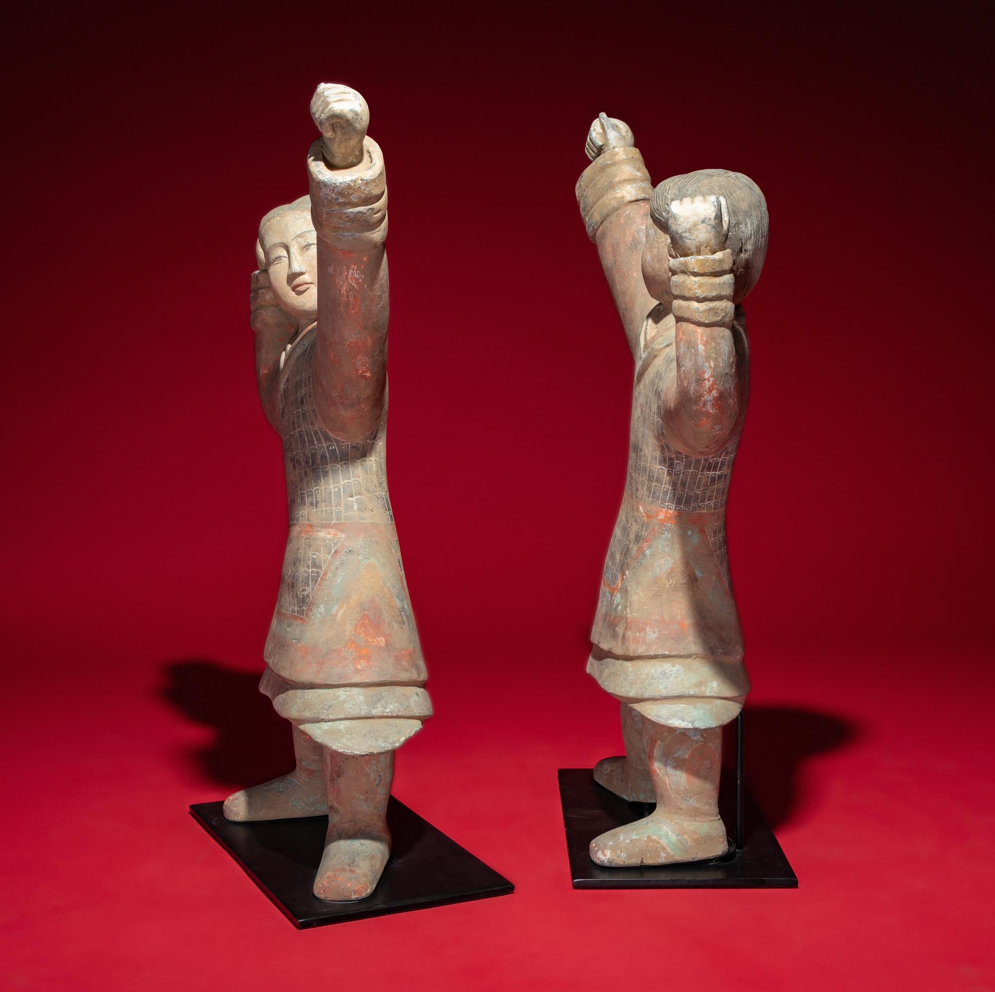 A Large Pair of Chinese Painted Pottery Archers, Western Han Dynasty — 西漢 彩繪射姿立俑一對