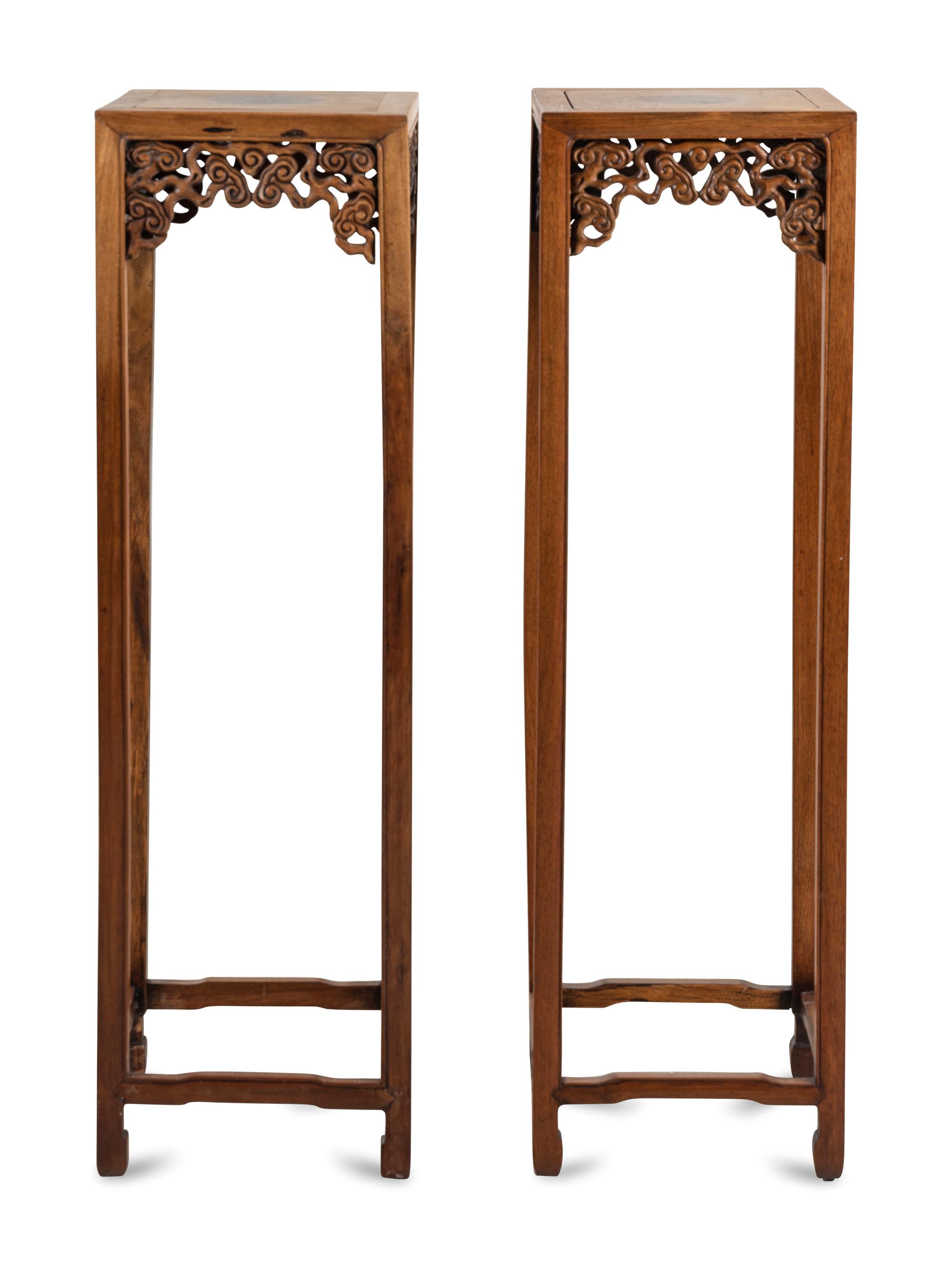 A Pair of Chinese Hardwood Jardiniere Stands