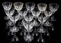 A Set of Thirteen Cut Glass Wines. Height 4 3/4 inches.